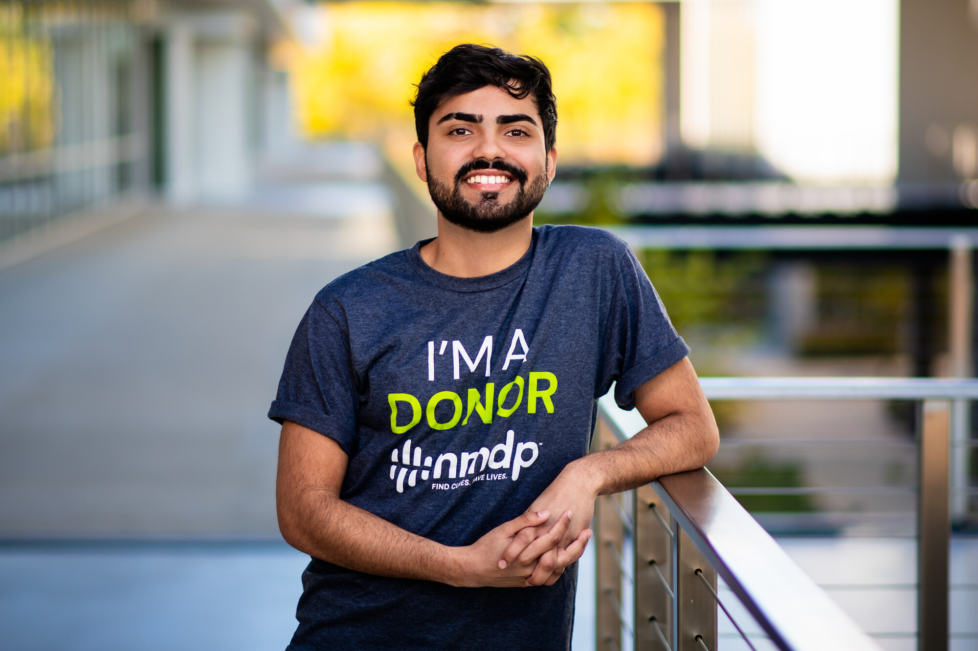 student leaning on ramp