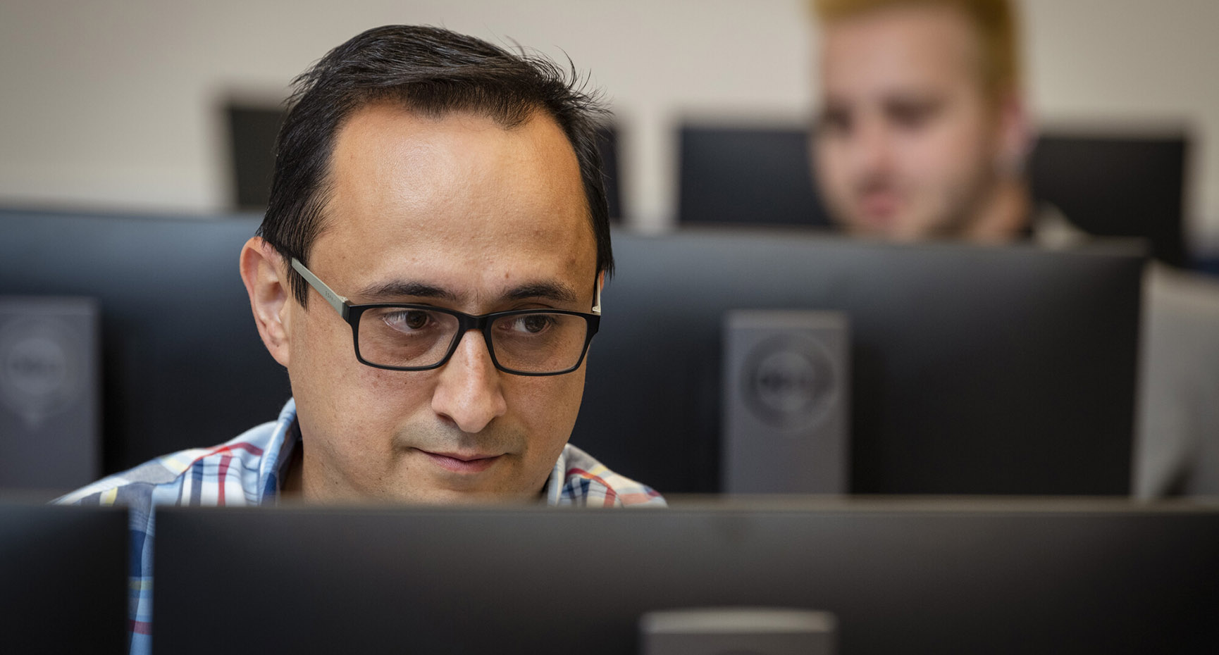 A bachelor of applied technology student reviews material for a course. 