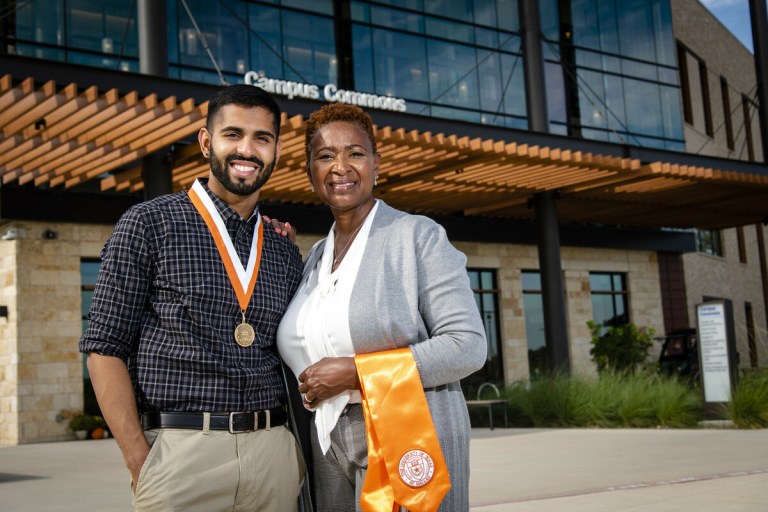 Collin College alum Samiul Haque and Sociology Professor Pam Gaiter pose for a picture outside of the Wylie Campus.