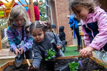 Children in the Collin College Lab School garden