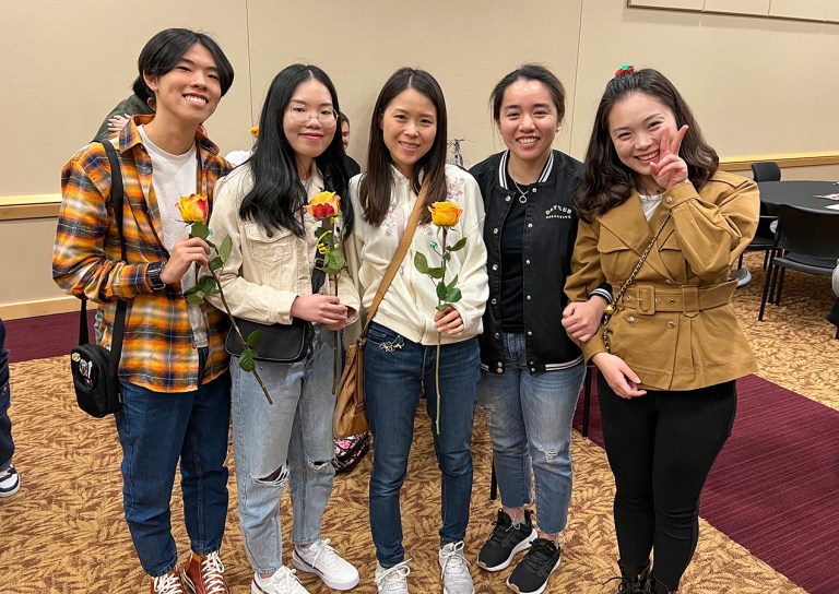 Students pose for photos at the English as a Second Language Celebration at Collin College